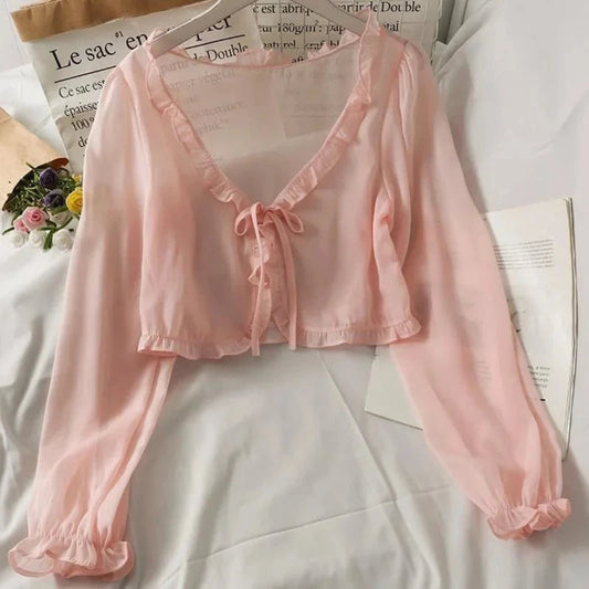 Elegant blus med rosett och spets