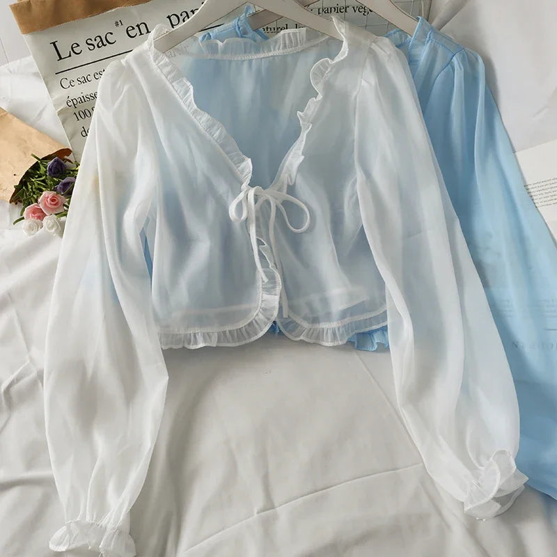 Elegant blus med rosett och spets